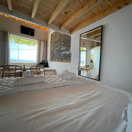 Апартаменты Michalelis Loft & Cave Пломарион Экстерьер фото