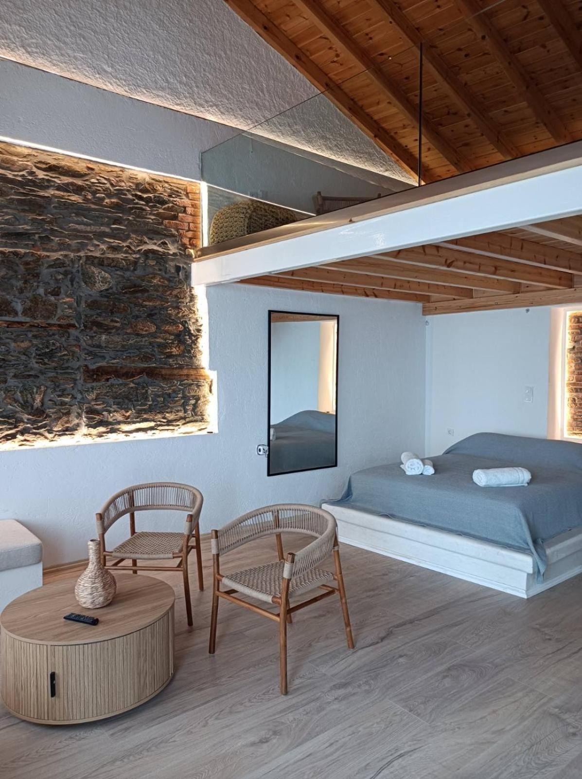 Апартаменты Michalelis Loft & Cave Пломарион Экстерьер фото
